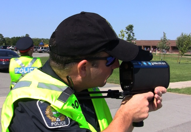 Officer performing lidar enforcement