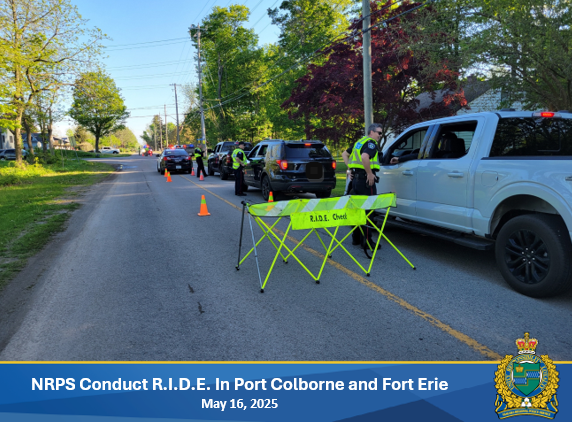 police officers talking to drivers at at RIDE stop