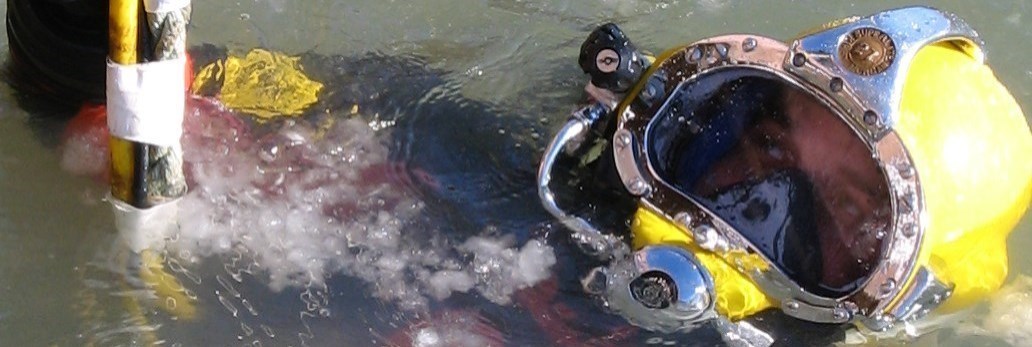 police diver in icy water