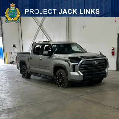 a toyota truck parked ina warehouse