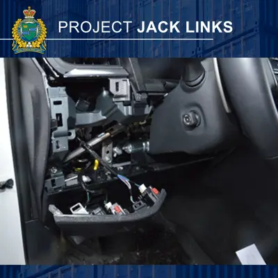 ripped out wiring on the driver side of a vehicle.