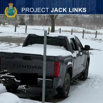 A toyota truck in a parking lot in the snow