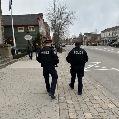 Officers walking down the street in NOTL