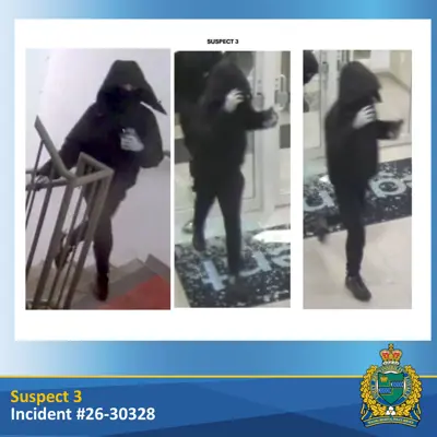 suspect wearing black clothing and black pants