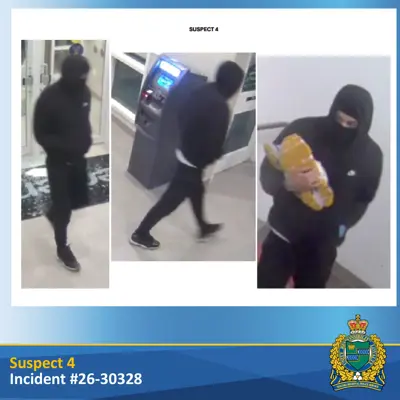 suspect wearing black clothing and black pants