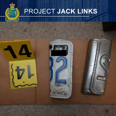 sections of license plates with an evidence marker
