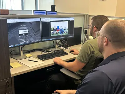 A computer screen with someone using axon software